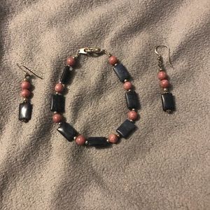 Pink and purple bracelet and earrings.